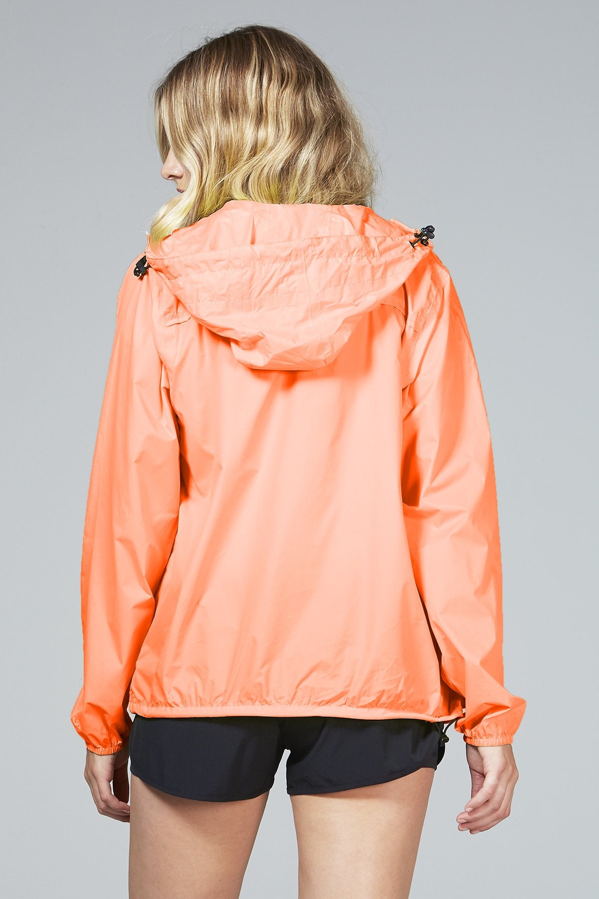 Mel - orange fluo full zip packable rain jacket